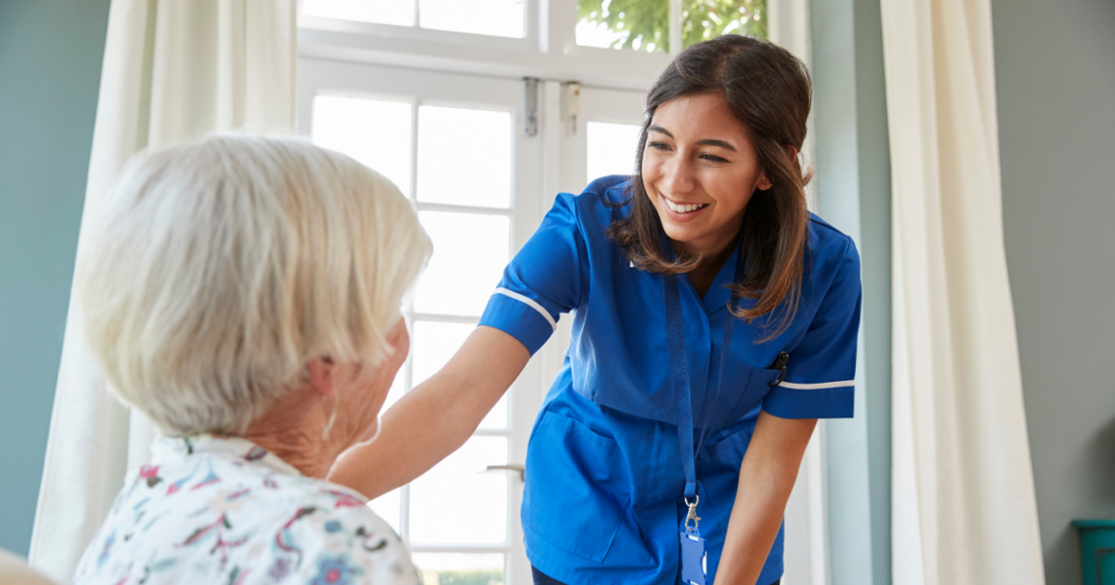 Home Health Caregiver Comforting Elderly