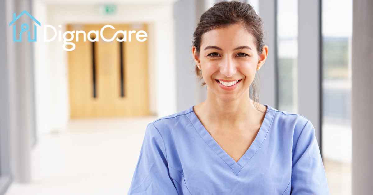 A caregiver looks happy as she looks forward to her career in home care.
