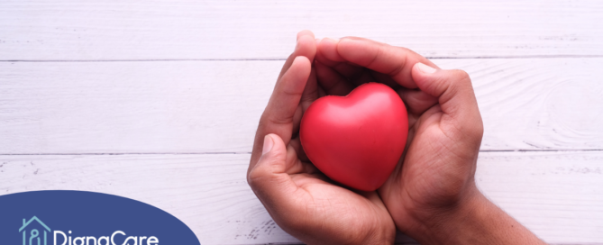 Hands holding a heart shape represent the care and support that those caring for seniors at home need.