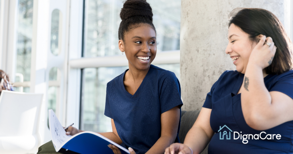 2 women study together to meet the requirements for being a professional caregiver.