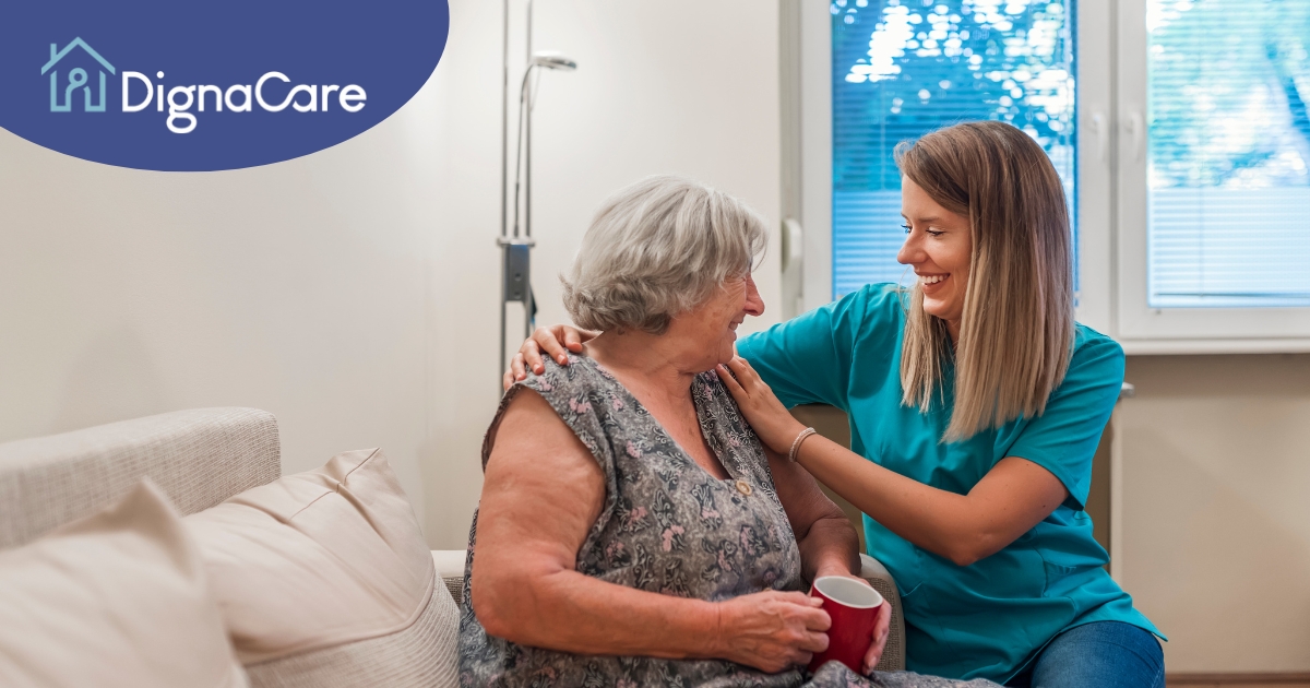 A home care provider compassionately tends to a senior client in their home.