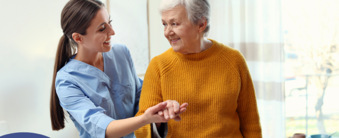 Professional caregivers, like this one who is helping a senior client walk, require a number of qualities and skills to provide compassionate personal care.