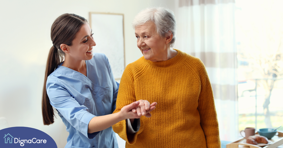 Professional caregivers, like this one who is helping a senior client walk, require a number of qualities and skills to provide compassionate personal care.