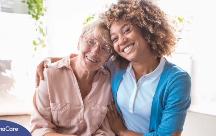 A caregiver enjoys professional caregiving as she helps a senior client.